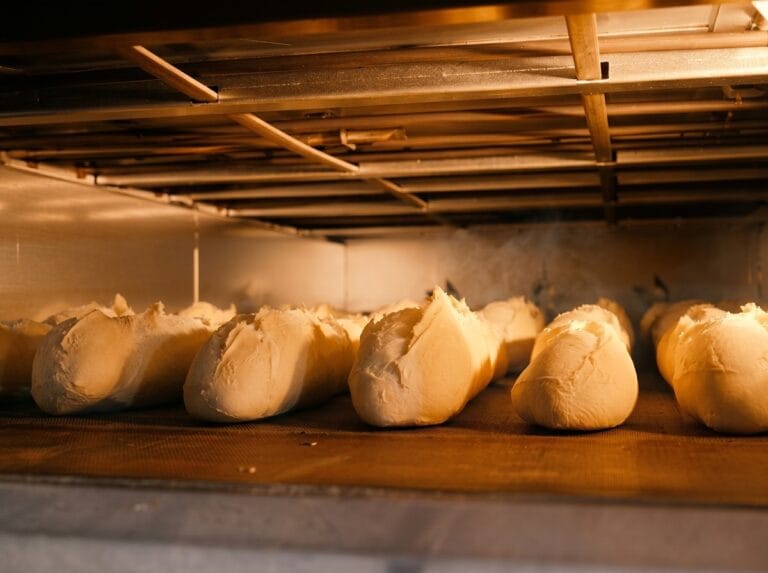 Gluten Relaxation in the Oven: The Power of Thermophilic Proteases